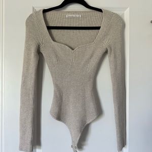 cream colored abercrombie and fitch knit body suit size XS fits small